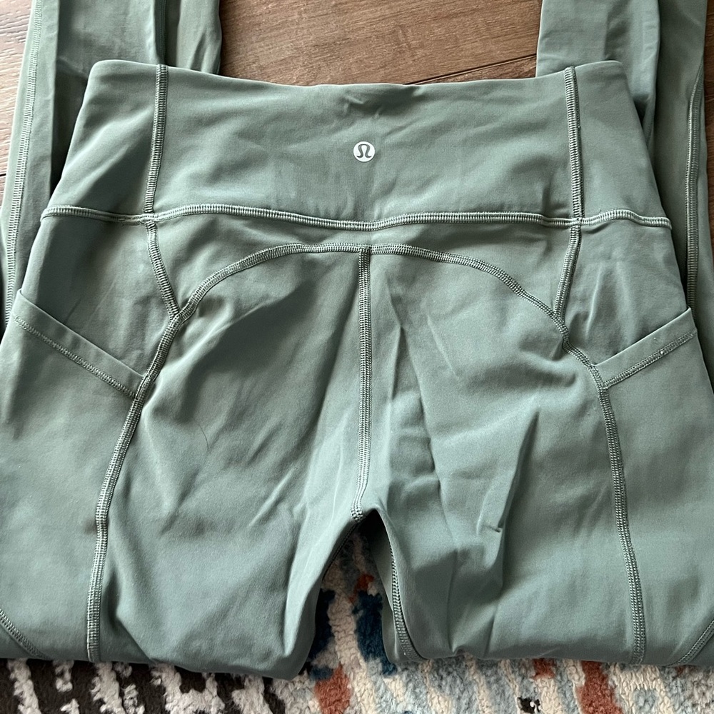 Green Lululemon leggings with pockets 28”